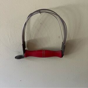 Antique hand dough mixer with wooden handle.